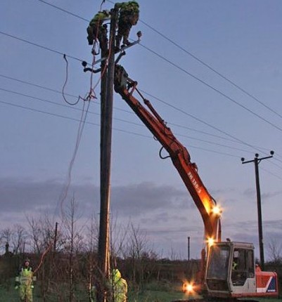 NIE team working on electricity poles