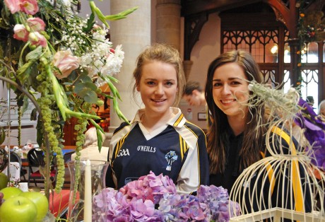 Zoe Power and Lucy McManus, members of the Clogher don Oige pictured at one of the displays at the Flower Festival in St. Michael's Church Enniskillen 