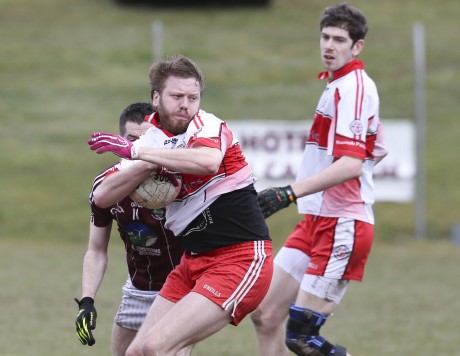 Ferghal O'Reilly turns from Niall McCusker