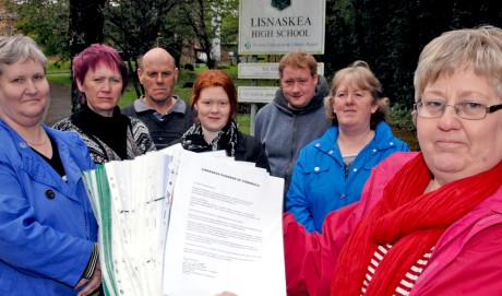 Jean Armstrong, holding copies of the Lisnaskea petitions collected in support of Lisnaskea High School staying open. Also in the picture are other members of the group who are fighting to keep the school open. They are, Shirley Morrison, Heather Cleave, George Morrison, Marty Moffatt, Christina Beacom and Phylis Beacom gkfh36
