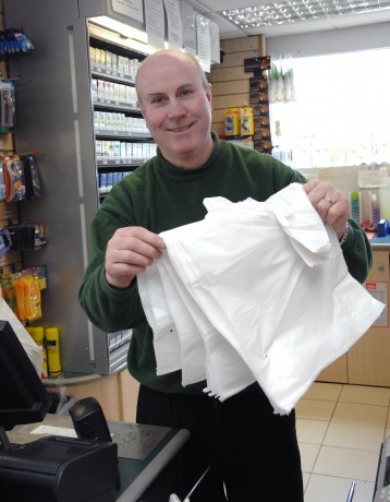 Gerard Nugent, of McBride's Spar Shop in Enniskillen finding people are bringing their own  plastic bags gkfh42