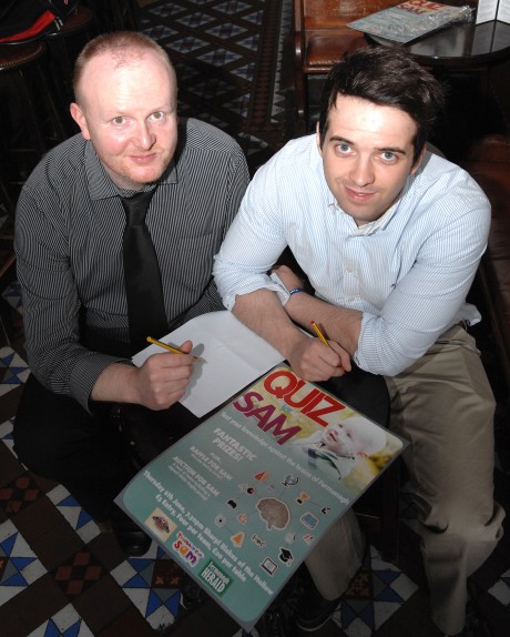 Fermanagh Herald reporter Gareth McKeown and .. . . . .  from Blakes of the Hollow making arrangements for the Quiz for Sam  which is taking place tonight in Blake's gkfh45