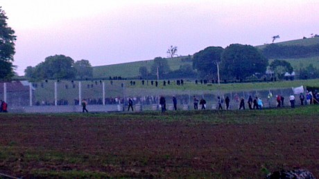 BREACH...A mobile phone image showing police response to a number of protesters breaching the outer fence
