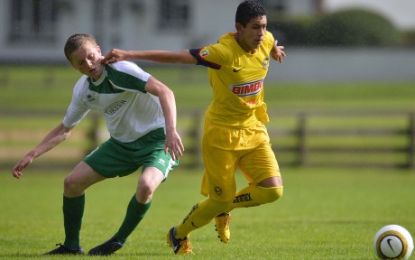  Fermanagh's Stuart Rainey and De Mexicos Brayan Estrada in action at Tuesday's Premier Game.
