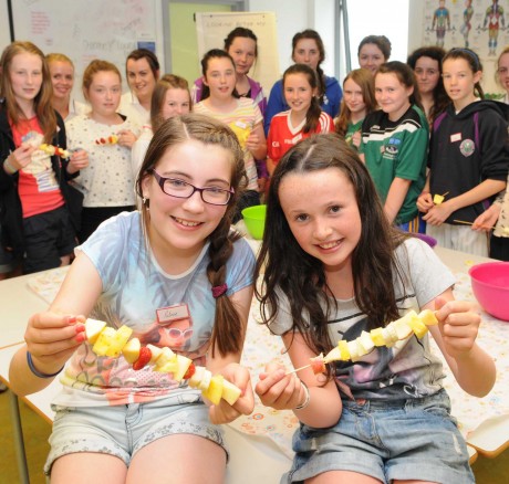 Patrice Murray and Isobel Eannetta enjoying their kebabs they made in the healthy Living class during  the Michaela Foundation Girls Summer Camp in St. Franchea's College 
