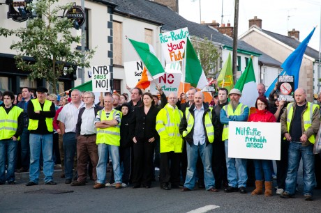 NOT WELCOME...a groupf o residents and protesters showing their opposition to a previous parade through Newtownbutler