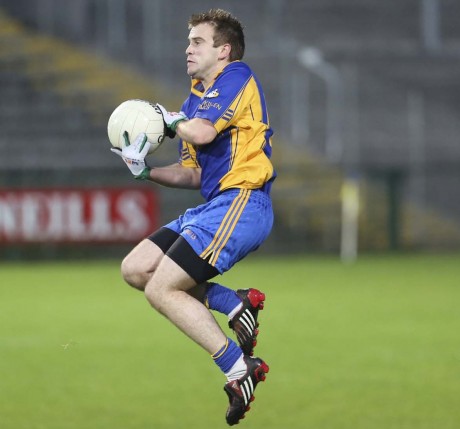 Conor Kelly takes to the air to collect a high ball