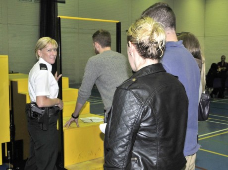 PSNI Recruitment event in the Lakeland Forum shows constable Leslie Ward with some of the people who turned up to learn more about the career