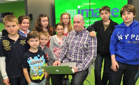 Young people with South West College lecturer at the Coder Dojo event