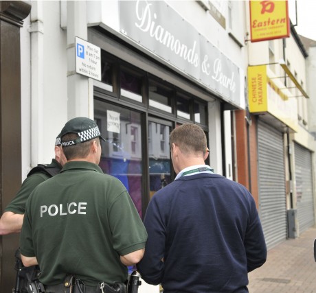 RAID... It is believed that a PSNI raid on the Diamonds and Pearls shop in Belmore Street last month is connected with a local couple who are accused of fraud