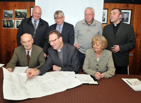 Dean Kenneth Hall, looking over the proposed changes to the St. Macartin's Cathedral Hall, with members of the select Vestry. They are back row, Jim Nixon, George Irvine, Brian Rutledge and Rev. Bob Clements. Front Row, Sam Morrow, Secretary and Hope Kerr, Treasurer