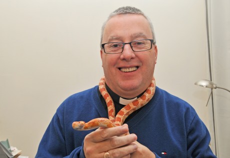 Rev. Brian Harpur with his pet snake