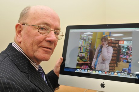 Bernard O'Connor with a photograph of his missing daughter Nollaig.