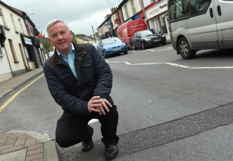 HOPES... SDLP Cllr Richie McPhillips hopes that the remaining road on Lisnaskea Main Street will be resurfaced