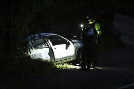 Police attend the scene of the car crash on the Lisnaskea road on Sunday evening