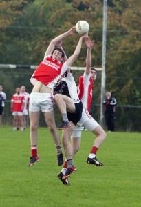 Mark McKenzie wins this ball on the stretch for Belnaleck