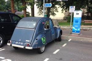 A Citroen 2CV makes use of one of Enniskillen's electric car charging points!