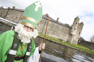 St. Patrick on board with the PSNI with Enniskillen Castle in the background.