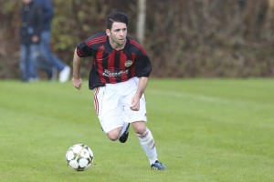 Dwayne Lyons on the wing with the ball for Enniskillen Santos