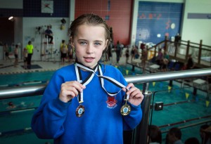 Ellie McCartney from the Enniskillen Model Primary School with her gold and bronze medals