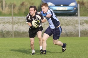 Ryan Boyle fighting to push forward for Aghadrumsee against Belcoo’s Brian Furey