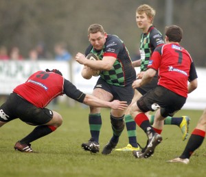 Philip Falconer got through for Clogher Valley's first try against Donaghadee.