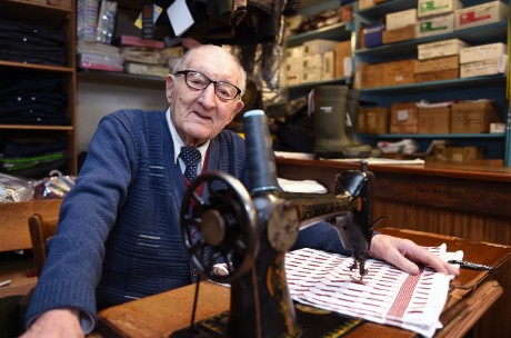 OLDEST SINGER IN TOWN.. Josie O'Hanlon is still fond of stitching on his Singer sewing machine that he bought in 1950