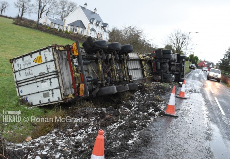 The overturned lorry was travelling along the diverted route for A509 traffic when it overturned at Arney