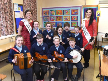 Maria Walsh, current Rose of Tralee, and Dearbhla McManus, Fermanagh Rose, were treated to an improptu trad session by students at St Mary's Primary School, Brookeborough