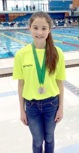 Caragh Leonard picked up gold and silver in the Irish Minor Schools Championships at the National Aquatic Centre on Sunday.