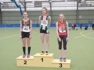 Lucia Warnock, left, receives her silver medal.