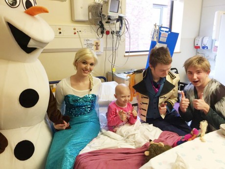 THUMBS UP... Little Eloise with some of the characters from 'Frozen' who visited her in hospital