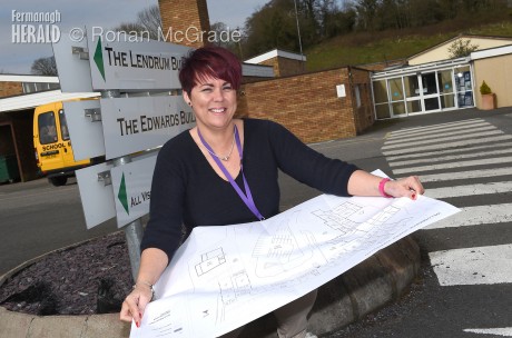 Willowbridge School principal Julie Murphy looks over the plans for the new school building which is due to be built on the current school site