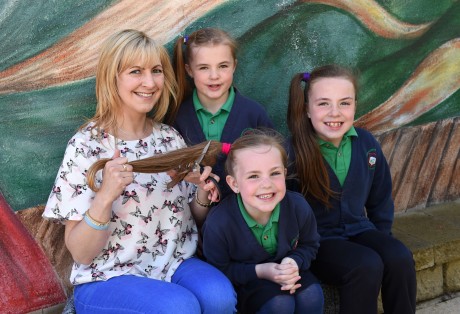 Majella Loughran with her daughers, Sophie, Annie and Cassie who are getting their hair cut off to raise money for charity.  The event takes place at the Knocks community hall at 4pm on Sunday 21st June    RMGFH20