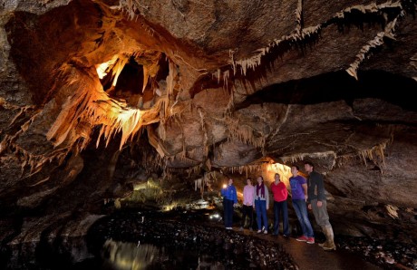Tour group admiring The Cradle, Marble Arch Caves