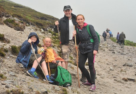 Pascal and Dympna Manley with their kids Oisin and Blathnaid from Roslea Co. Fermanagh on their way to the summit of Croagh Patrick on reek Sunday    Pic Conor McKeown
