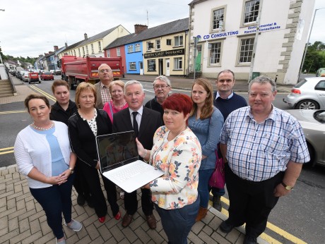 Businesses in Lisnaskea are upset that fibre optic Broadband is unavailable to them and that current slow internet speeds are hindering them.  From left, Sandra Quigley (Eurospar), Roisin Maguire (Eurospar), Patricia Rafferty (Lisnaskea Credit Union), Noel Robinson (Dowlers Funeral Services), Teresa McGovern (Mac's Bar), Councillor Richie McPhillips (R.P. McPhillips Insurance), Stephen McCaffrey (Lisnaskea Credit Union), Nina Kelly-Kleine (Donn Carragh Hotel and Leonard Auctioneers), Leanne McGovern (Mac's Bar), Fergal McElgunn (property owner) and Eugene McGovern (Mac's Bar)    RMGFH11