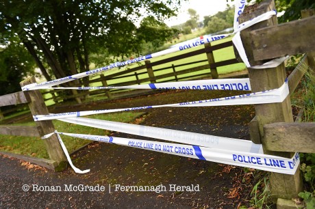 Police tape seals off the entrances to the grass area beside Stuart’s Carpark    RMGFH111