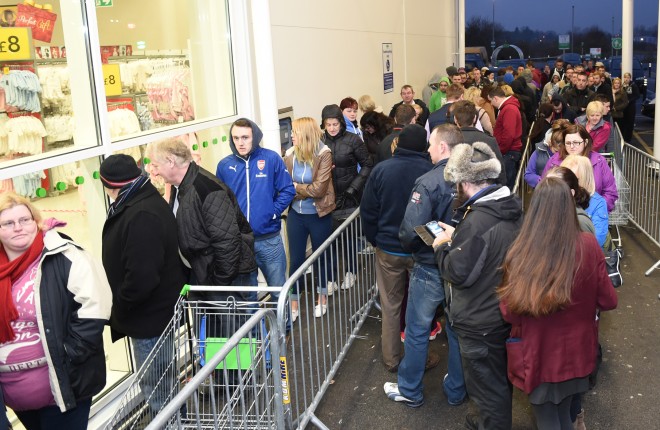 QUEUE.. Crowds flocked to Asda in their hundreds to pick up a bargain at the Black Friday sales.  RMGFH73
