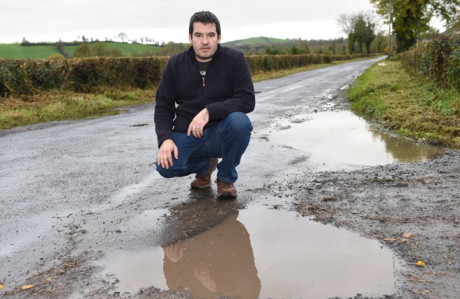 Dessie McKenzie is upset that the potholes in Boho have not been filled in and continue to cause problems for motorists in the area    RMG22