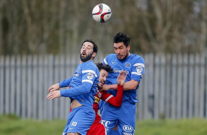 Cliftonville's Thomas Cosgrove and Ballinamallard's Johnny Lafferty and Emmett Friars in action. Picture: Kevin Scott / Presseye)
