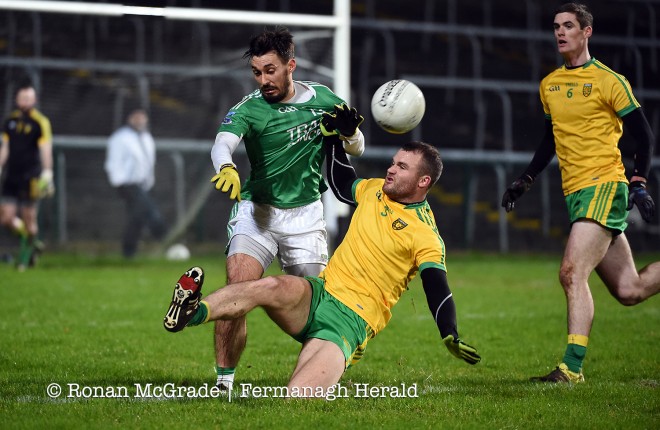 Fermanagh’s Ryan Hanna collides with his opponent    Picture: Ronan McGrade