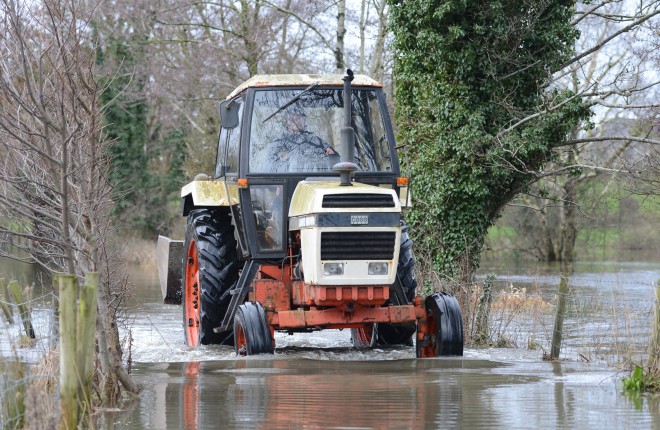 Martin McGuinness can only get to his house at Derryelvin near Newtownbutler via tractor due to his flooded lane    RMG110