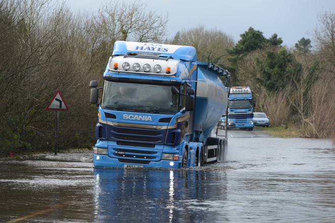 Lorries took it slow as they passed through the floods between Lisnaskea and Derrylin earlier this year    RMG14