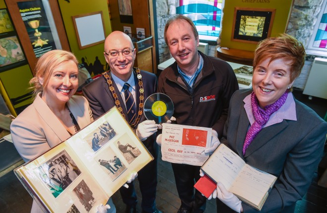 From left, Noreen Kettyles (Cecil's daughter), Councillor Thomas O'Reilly (Chairman, Fermanagh and Omagh District Council), Ray Kettyles (Cecil's son) and Sinead O'Reilly (Development Officer of museum services)    RMG86