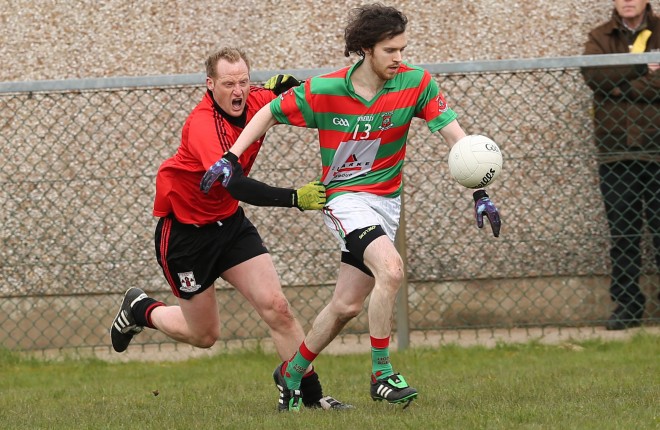 Brookeborough's Fergal Campbell gets to grips with Lisnaskea's Justin Kelly on the first day of the Leagues