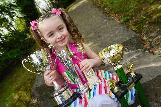 Kaela Toye from Roslea with some of the recent awards she won for line dancing    RMG22