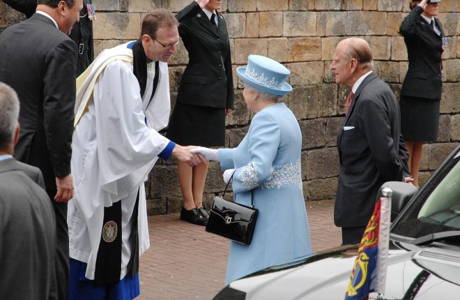 Dean Kenneth Hall welcomes the Queen and Prince Phillip to St. Macartin's four years ago gkfh36
