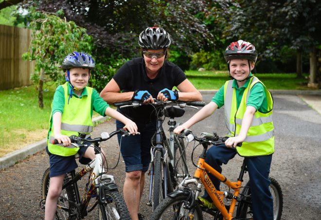 Bernie Traynor who is doing the sponsored cycle with her grandsons Darragh and Conor    RMG04