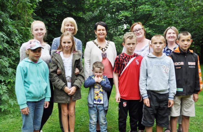Chernobyl children with their local hosts and Cllr Mary Garrity, Chairman of Fermanagh and Omagh District Council 